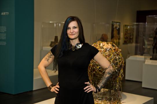 Amanda M. Maples in the Thomas K. Seligman Gallery of African Art, Cantor Arts Center, where she installed the permanent exhibition In Dialogue: African Arts. Photo courtesy of Cantor Arts Center, Stanford University.